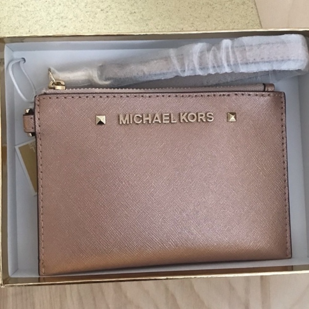 COPY - Micheal Kors Rose gold Wristlet wallet/ card